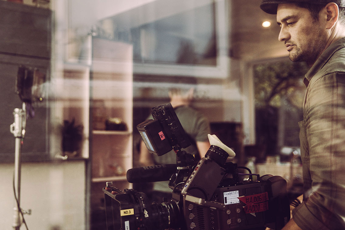 Jez Smith operating camera on set